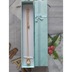 Leopard print necklace and smiling Labubu