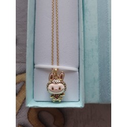 Leopard print necklace and smiling Labubu