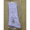 White leather glove with gold embroidered SC 1 logo